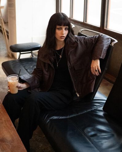 Woman sitting in coffee shop