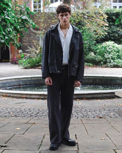 Man standing near fountain
