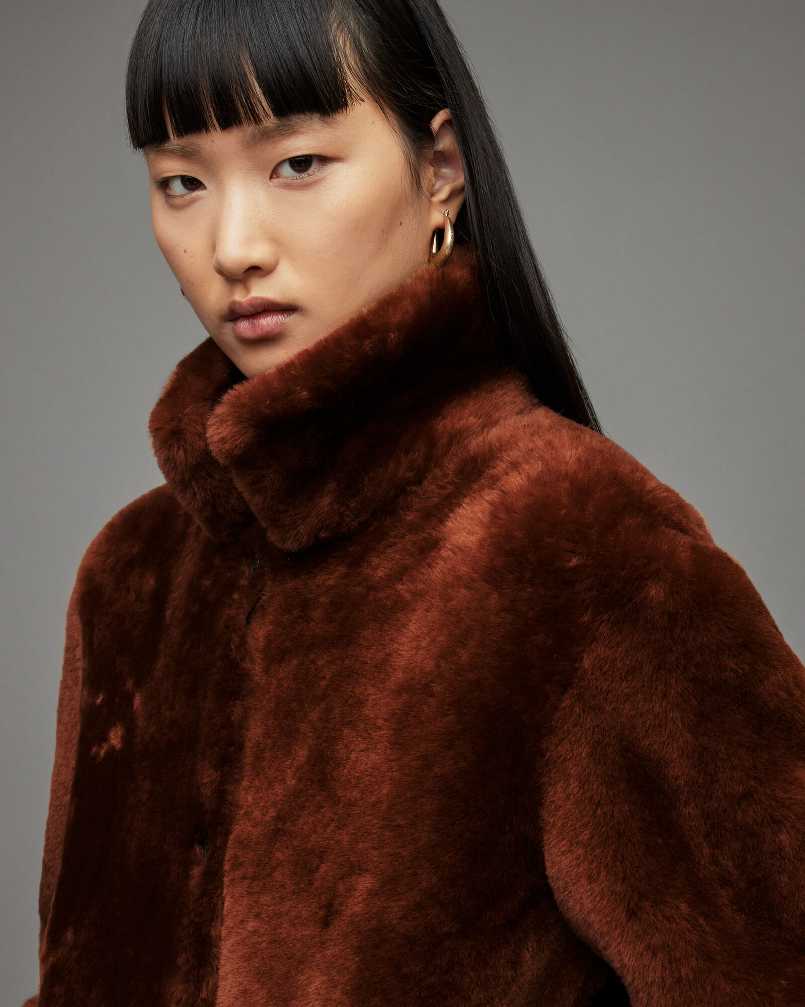 Brown Womens Clothing Coats Long coats and winter coats AllSaints Womens Serra Reversible Shearling Coat in Dark Brown 