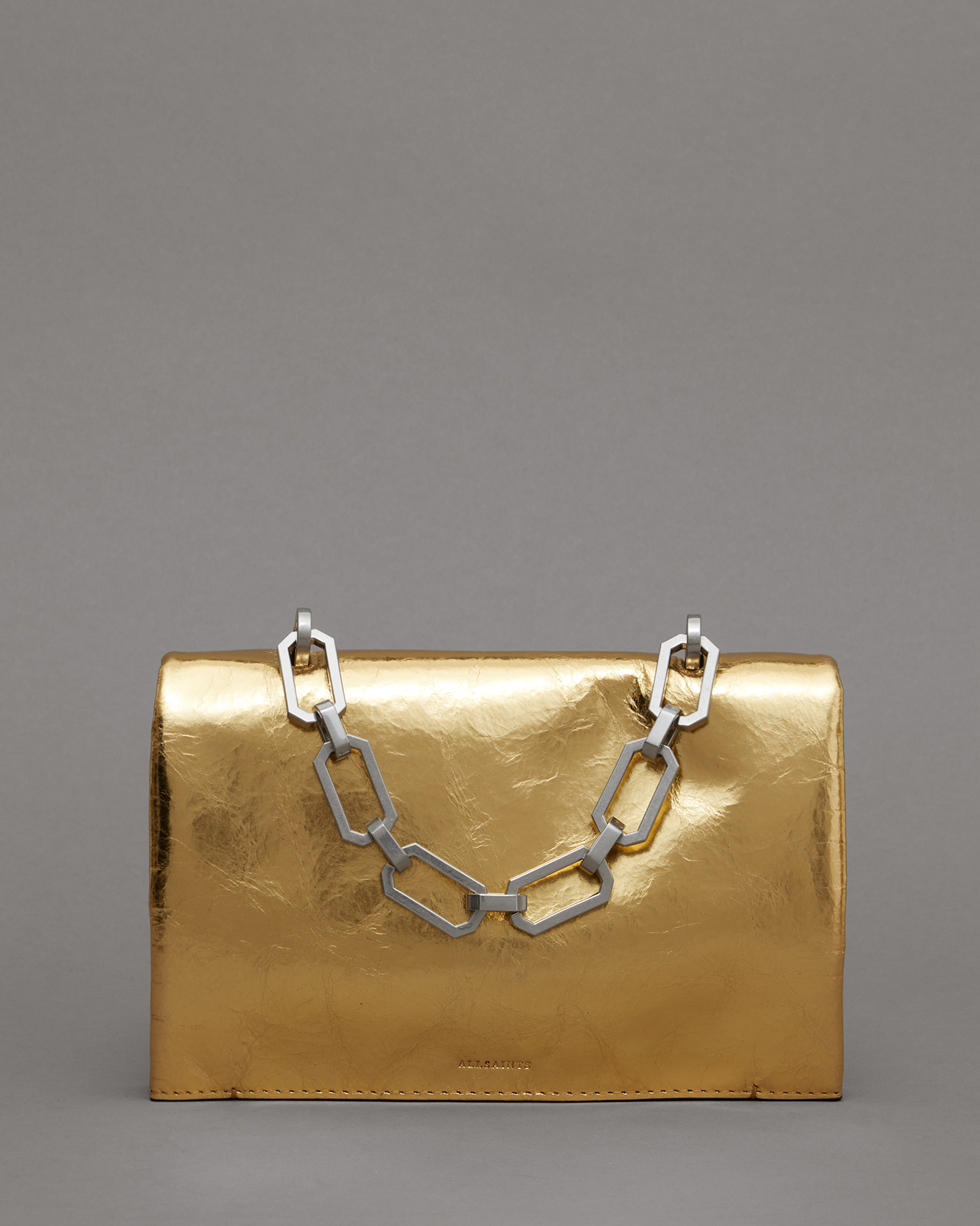 Allsaints Yua Leather Removable Chain Clutch Bag In Gold
